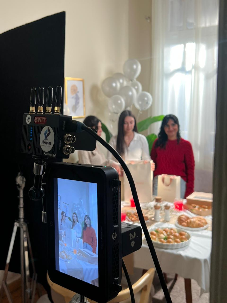 Behind the camera